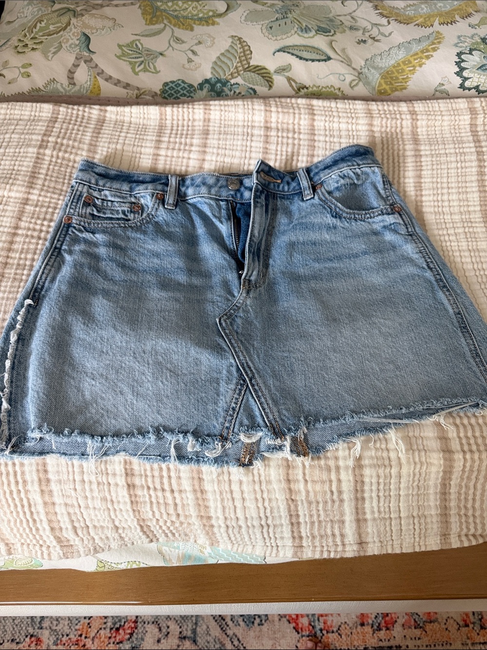 American Eagle Outfitters Light Blue Denim Mini Skirt with Frayed Hem